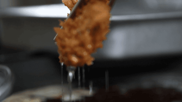 Pork cutlet taken out of hot oil