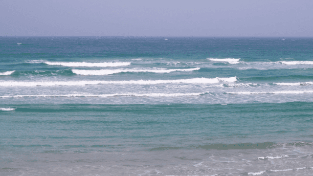 Sea with crashing turquoise waves