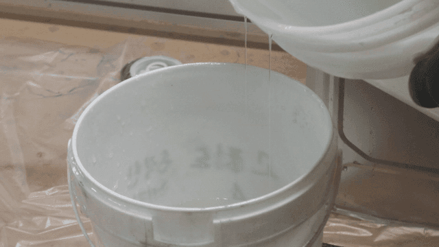Liquid being poured into a container
