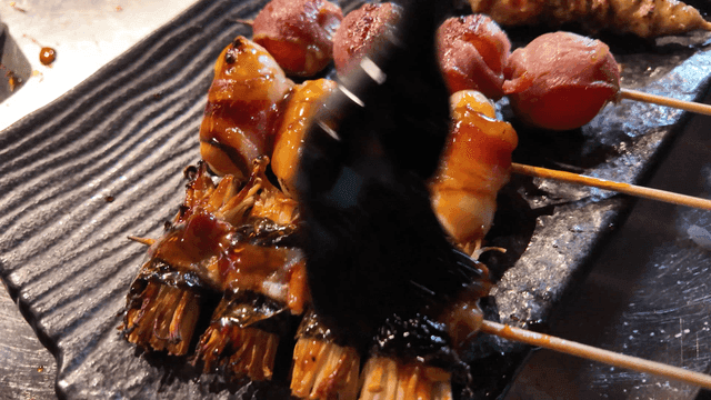 Brush for seasoning skewers with bacon and vegetables