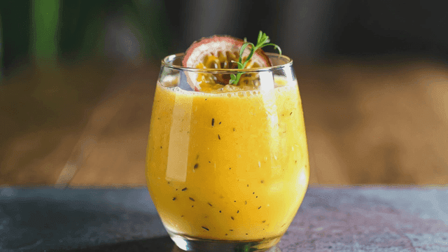 Refreshing passion fruit juice in glass
