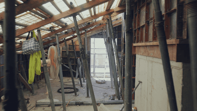Inside a construction site with scaffolding
