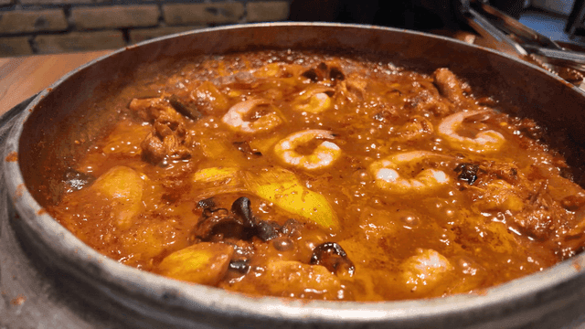 Spicy shrimp jjagalbi boiling in pot