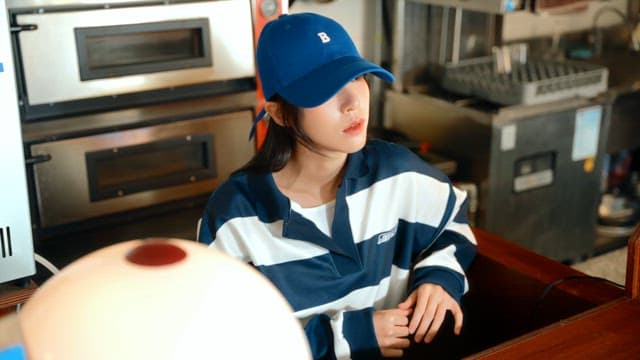 Woman taking phone order at the counter