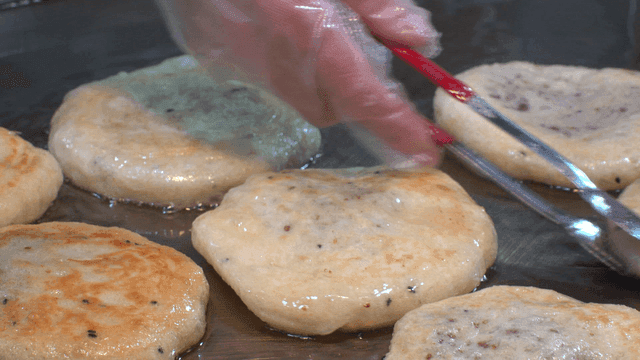 Hotteok fried on iron plate