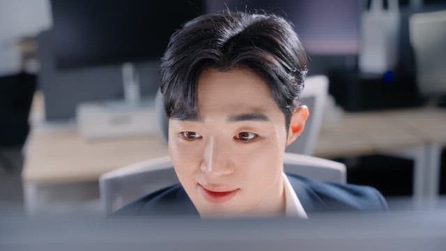 Focused man working at a desk in an office