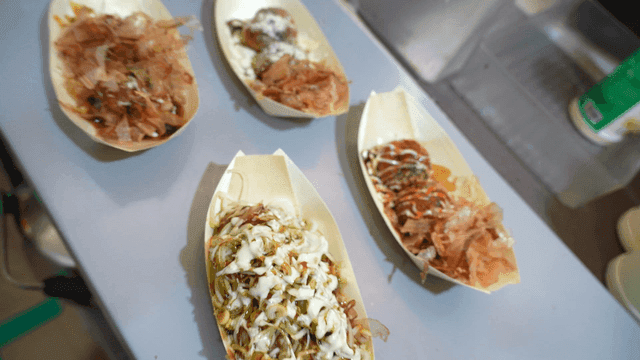 Takoyaki served on paper plate