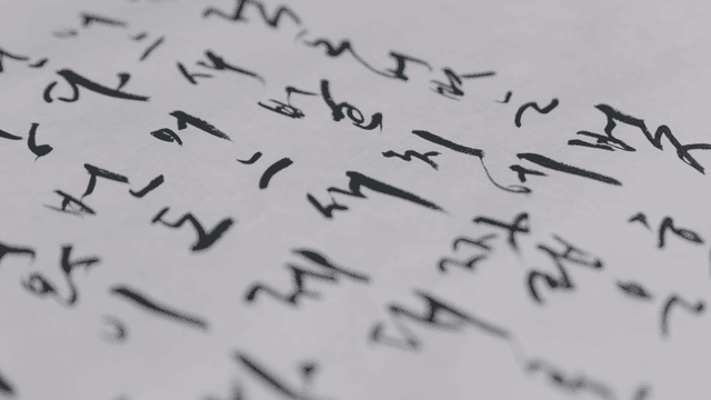 Korean calligraphy on white paper