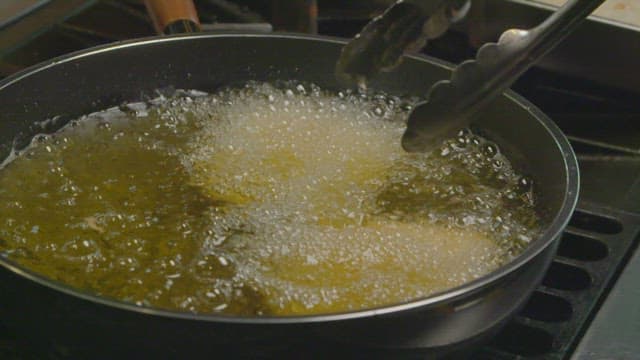 Pork cutlet cooked in boiling oil