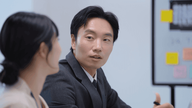 Office meeting with focused discussion