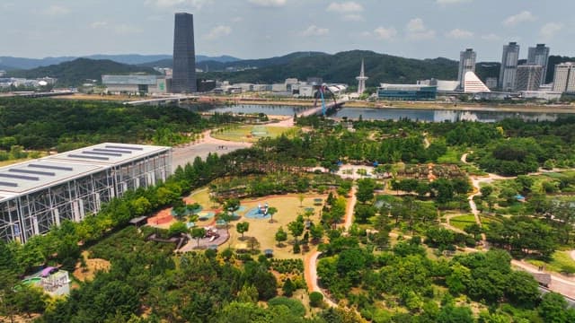 Green park with cityscape background