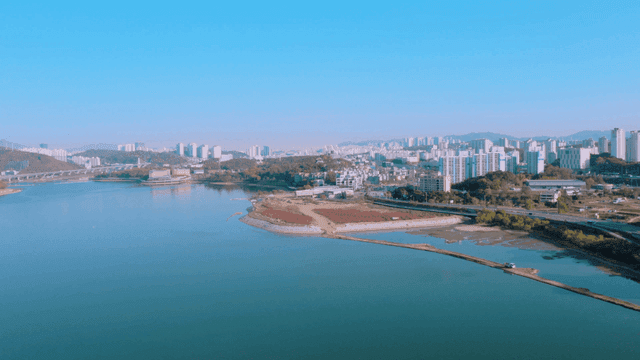 A river flowing through a modern city