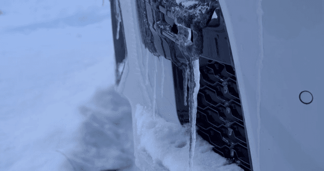 Icicles hanging from a car bumper