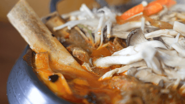 Braised beef short ribs with mushrooms and vegetables