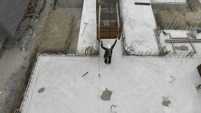 Construction site with a crane lifting materials