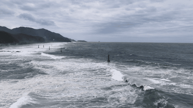 Waves crashing on a rocky coastline