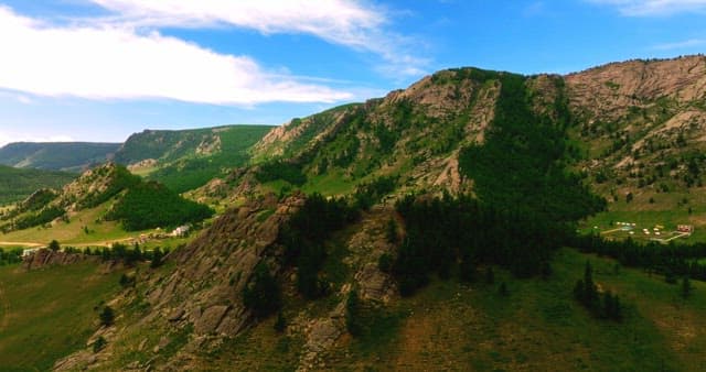 Mountainous landscape with green valleys