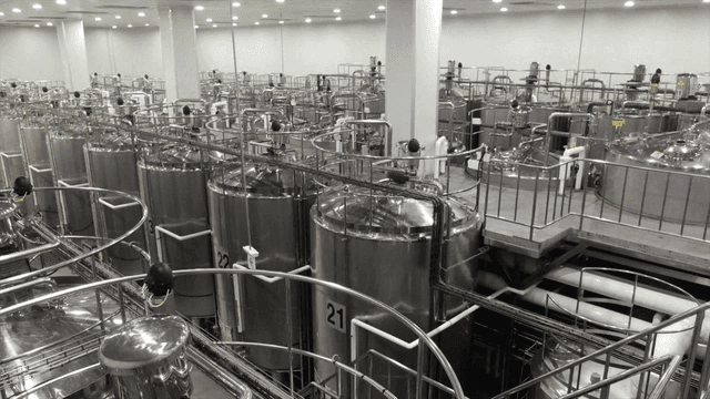 Large industrial tanks in a factory