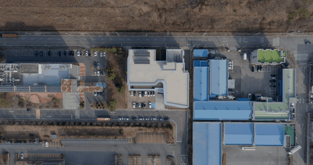 City view with parking lot and road