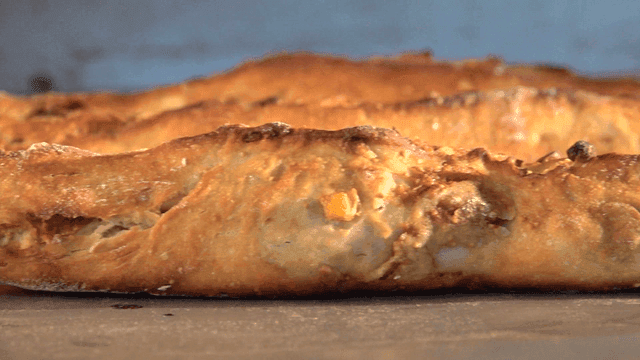 Freshly baked baguette from oven