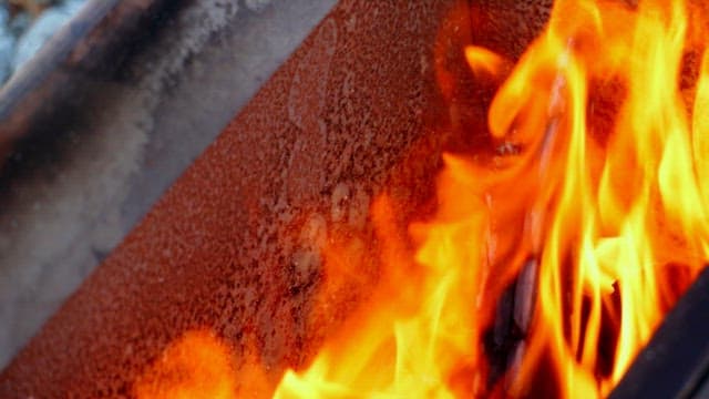 Intense campfire burning in a portable stove