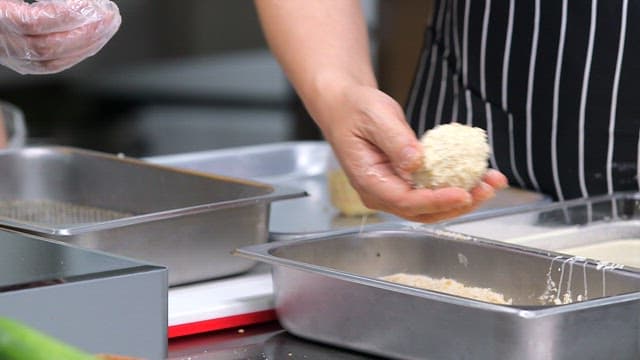 Preparing and frying breaded croquette batter