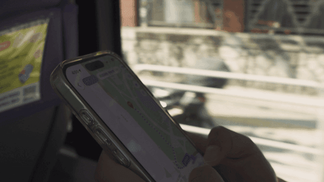 Finding directions on smartphone on bus is easy.