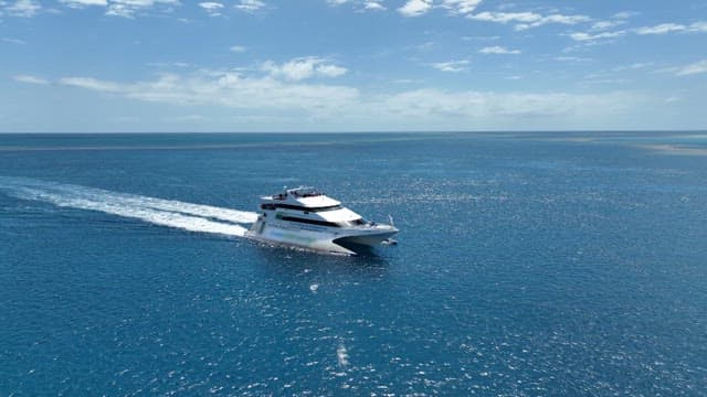 Speedboat Cruising on Clear Blue Waters