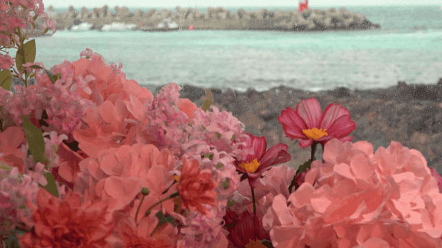Sea scenery with flowers.