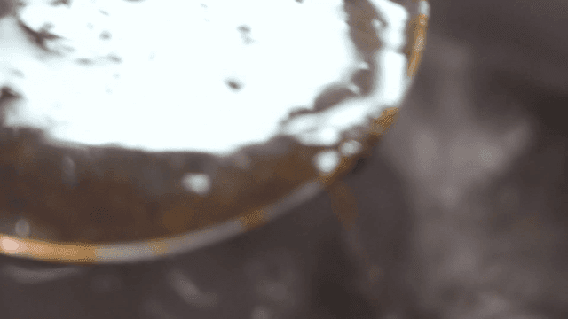 Seaweed soup being stirred in a pot