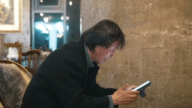 Man yelling at smartphone