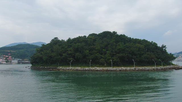 Small island surrounded by calm waters