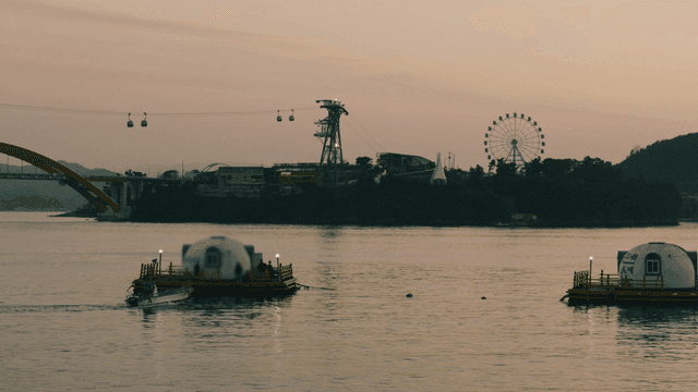 Seascape with cable car in evening