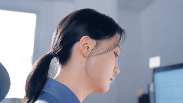 Woman working at a desk in an office