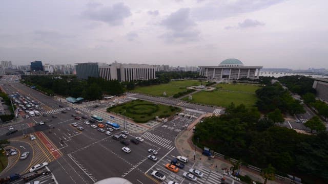 Cityscape with Busy Roads and National Assembly Building