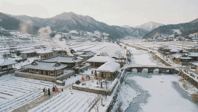 Snow-covered traditional Korean village