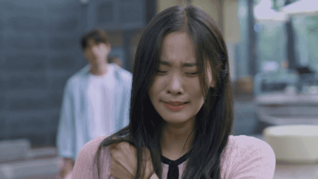 Woman weeping as she leaves her man