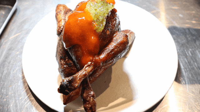 Whole chicken topped with hot sauce