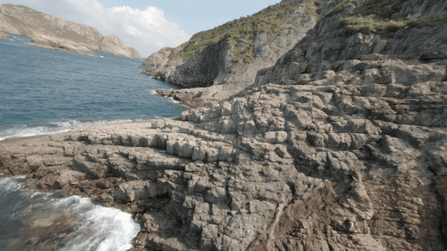 Rocky coastline with clear blue sea