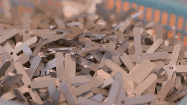 Metal parts piled in a basket