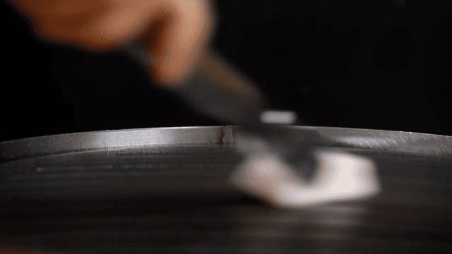 Scene of oiling the grill