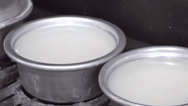Pots for cooking rice on the stove