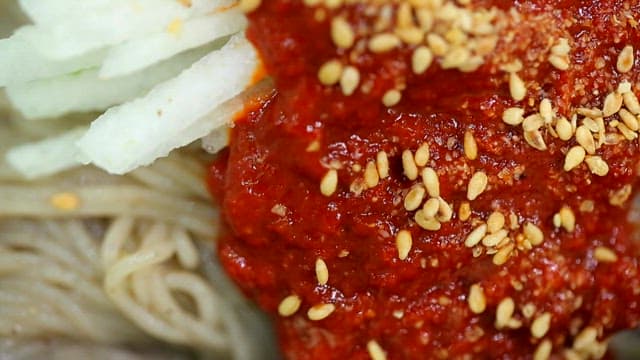 Spicy buckwheat noodles with egg and vegetables