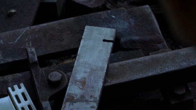 Metal being cut with sparks flying