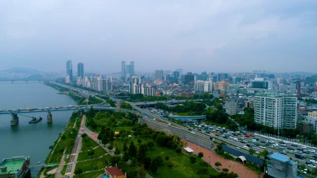 City Road with Traffic Jam under Cloudy Sky