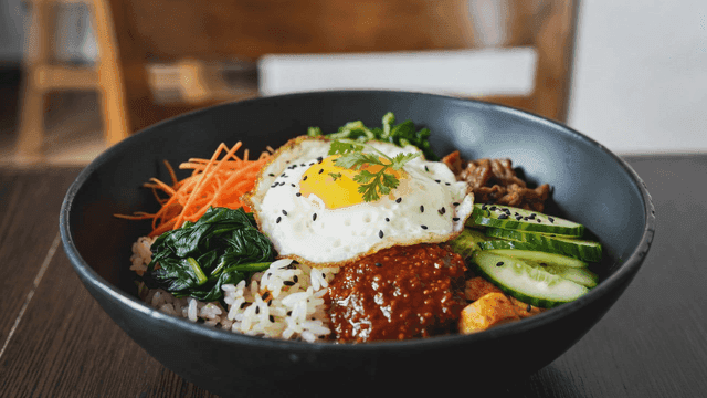Bowl of bibimbap with fresh vegetables
