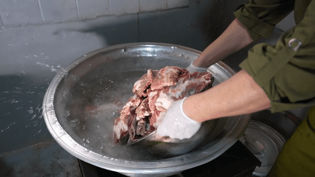 Beef ribs poured into large pot