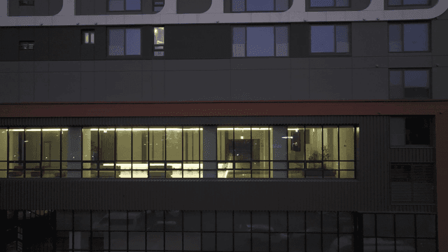 Modern building with lights on