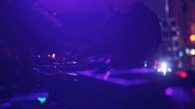 DJ Performing at a Nightclub