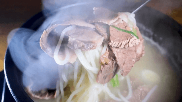 Steaming bowl of ox bone soup